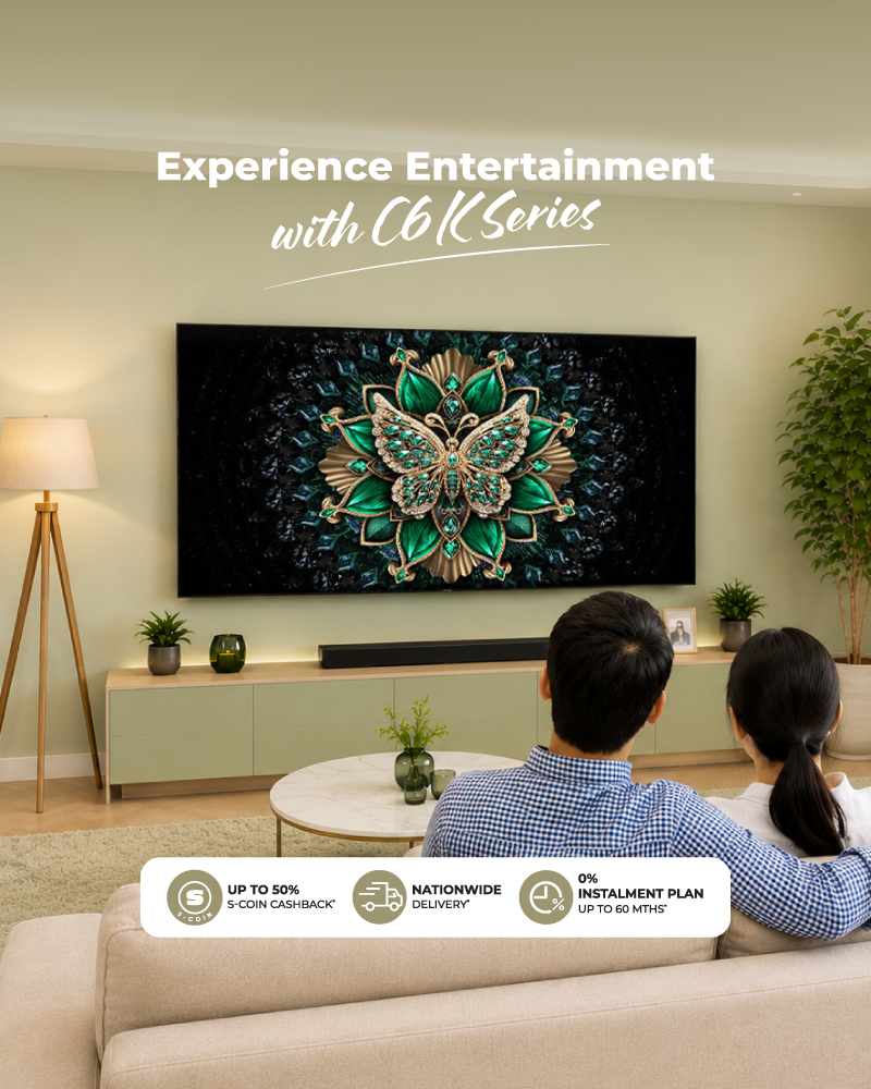 A couple watch TCL C6K Series TV in a modern living room
