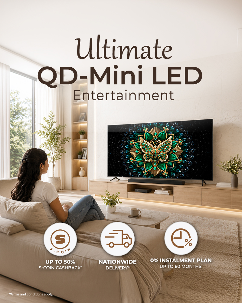 A couple watching TCL C6K Series TV in a modern living room