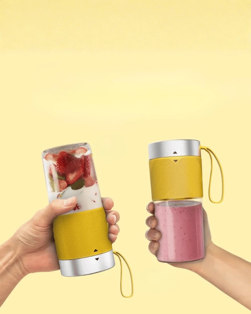 Tefal portable blender creating smoothies in yellow and white design.