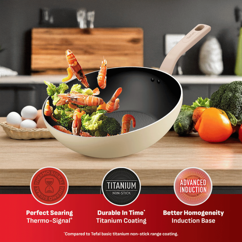 Non-stick frypan cooking shrimp with even heat induction base